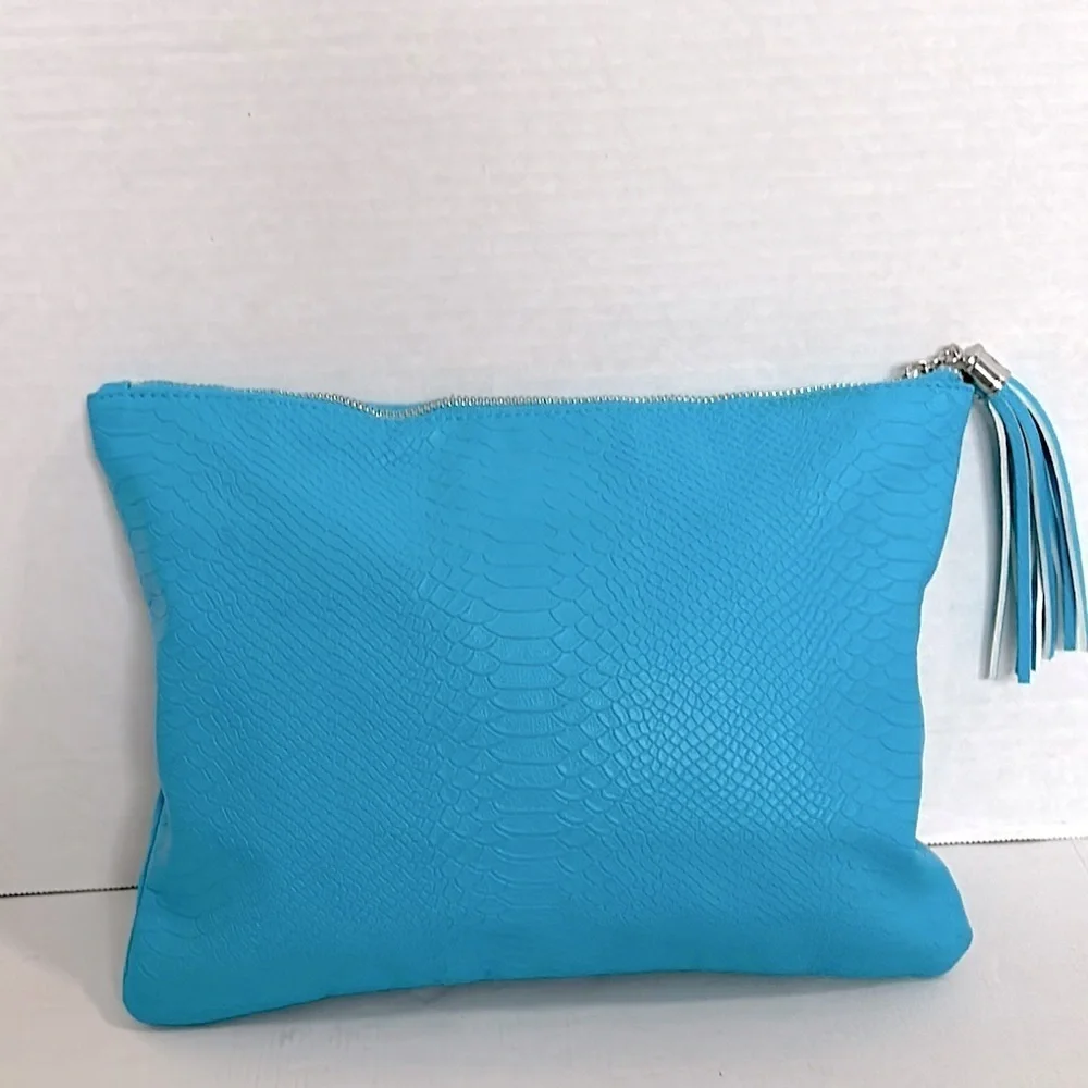 Vibrant Blue Rodan + Fields snake print Cosmetic Bag with Decorative Tassel